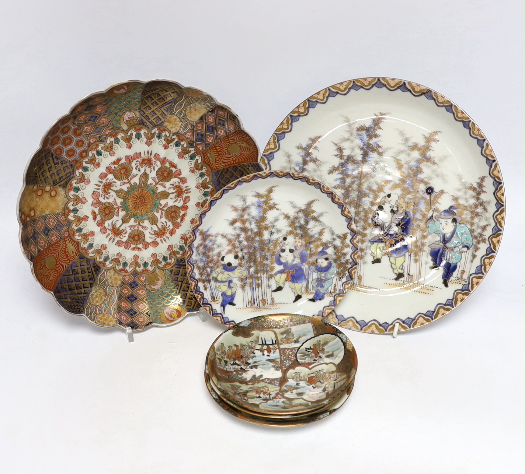 Assorted Japanese ceramics including Imari plate and three satsuma saucers, largest 25cm in diameter